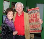 Friend and songwriter Jerry Foster who's holding a Midnite Jamboree poster that Ron Harman designed